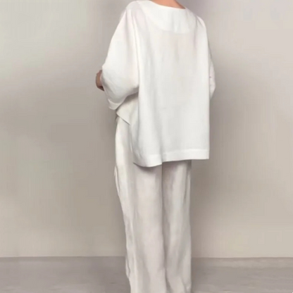 💎 2-piece cotton-linen set with an uneven hem – V-neck top + wide-leg pants, breathable & effortlessly stylish 🍂👚